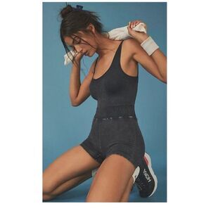 Free People Movement Good Karma Runsie is a sleeveless, athletic romper
